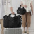 诗迦努旅行包男女款大容量行李包单肩斜挎包手提包 黑色