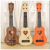 伊薇儿童吉他初学者吉他可弹奏吉他乐器玩具多种号型 0英寸 中号咖啡色38cm 琴谱拔片