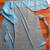 CPE塑料一次性隔离衣带袖防尘防水防护围裙罩衣1件/袋 XXL*蓝色