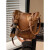 酷奇袋鼠（KUQIDAISHU）品牌复古小众设计包包女士2024新款质感百搭斜挎包手提水桶包 黑色 +挂件