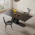 达曼舒尔现代意式简约黑色岩板餐桌椅组合家用小户型饭厅长方形岛台饭桌 黑色 一桌四椅 1.3米*80*75