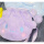 紫色毛球束口袋斜挎包