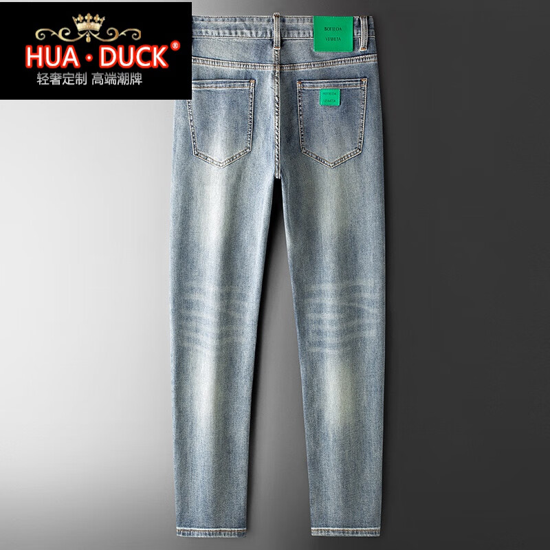 hua · duck国际品牌轻奢侈春夏浅蓝色牛仔裤男流行绿色皮标装饰弹力