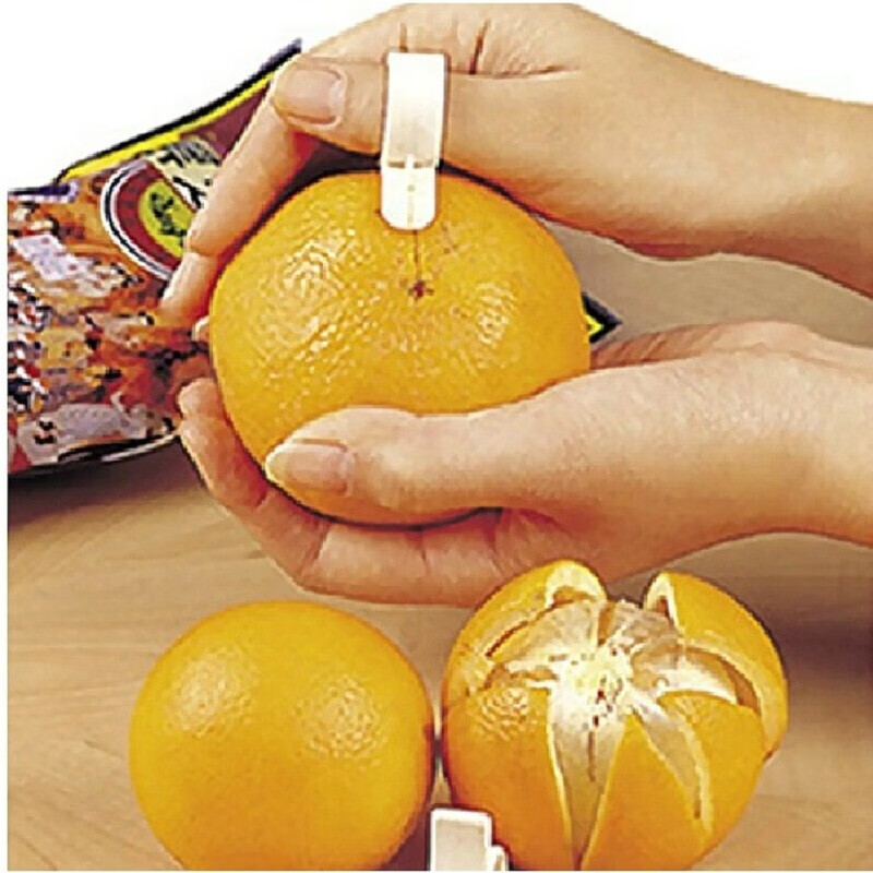 实用创意多功能厨房扒橙子剥皮器塑料指环型开橙器手拨橙剥橙水果橘子