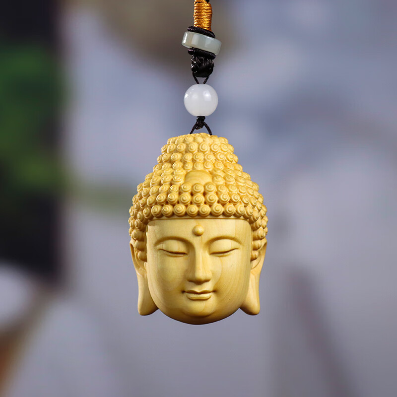 溪春水黄杨木雕释迦摩尼如来佛头手把件中式实木随身盘玩工艺品吊坠