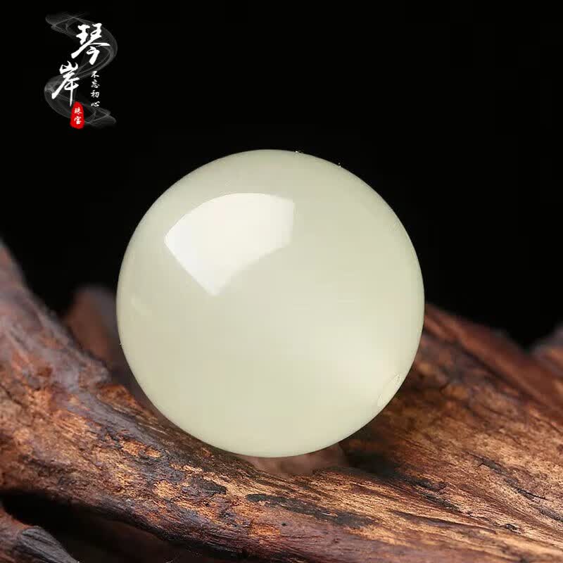 琴岸夜明珠天然夜光珠DIY散珠配饰萤石文玩夜光珠单颗配饰夜明珠散珠 夜光珠直径约18mm有孔属于什么档次？