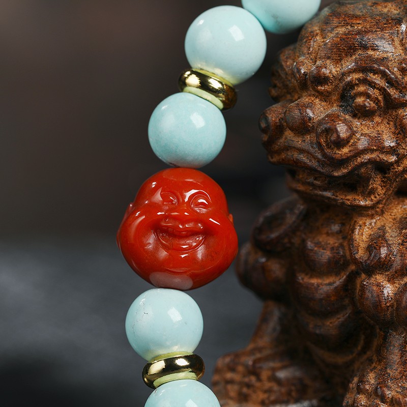 欧采妮红佛头绿松石手串