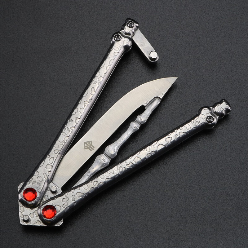 名维骷髅刀 骷髅头一体钛柄折叠花式甩手刀训练刀户外蝴蝶练习刀不开