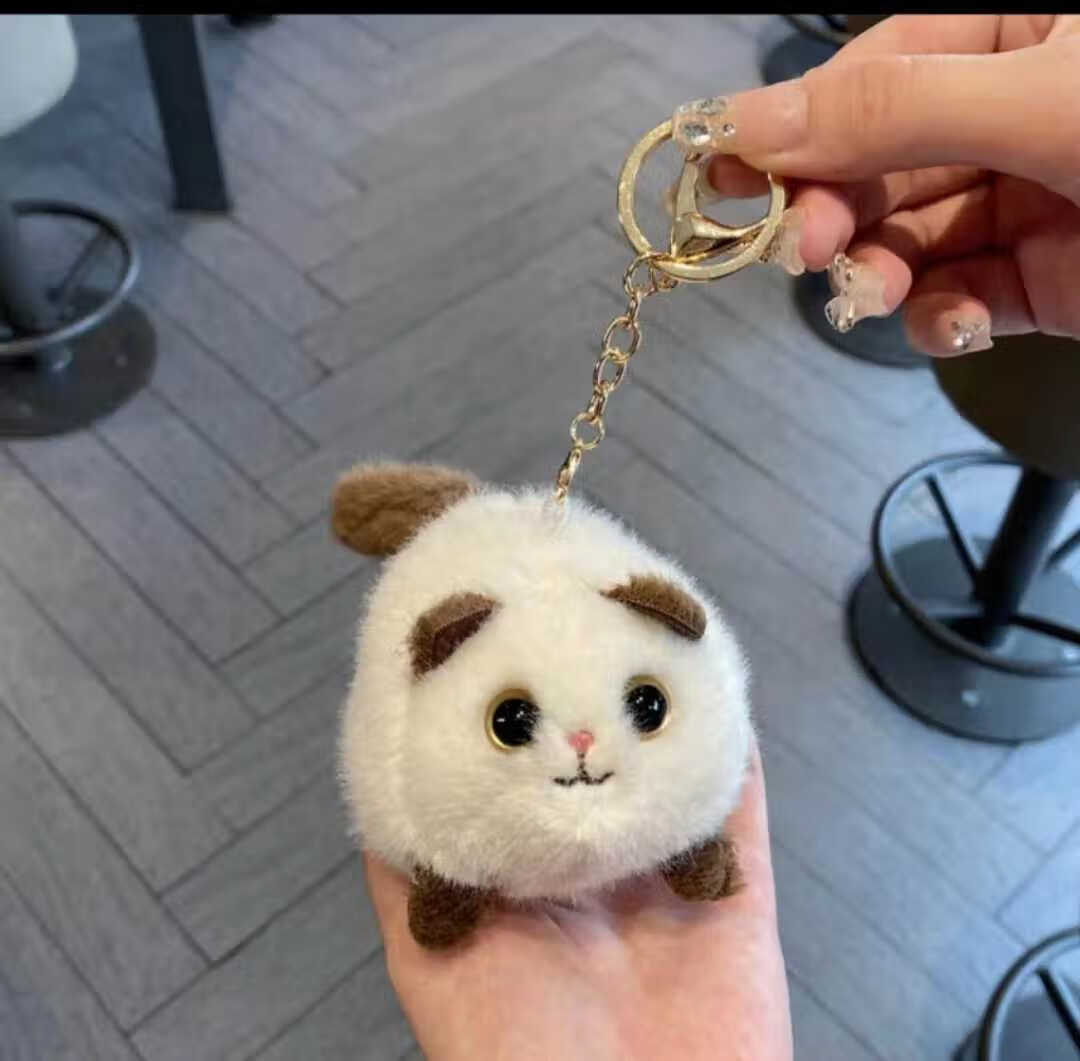 启蒙卡通可爱创意有趣的拉线会摇尾巴还会吱吱叫的小猫毛绒挂件 摇