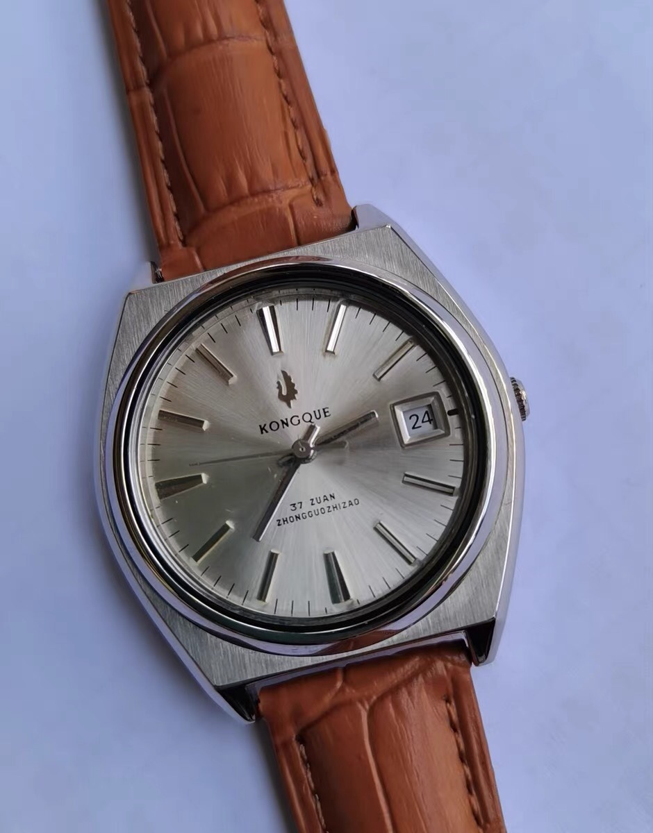 国产库存老孔雀牌全自动机械手表经典时尚潮流精钢单日历复古珍品