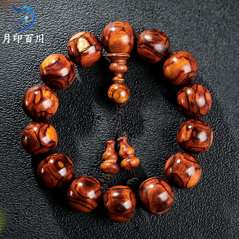 月印百川 海南黄花梨手串对眼鬼脸纹文玩佛珠男女款手链礼盒包装约16mm属于什么档次？