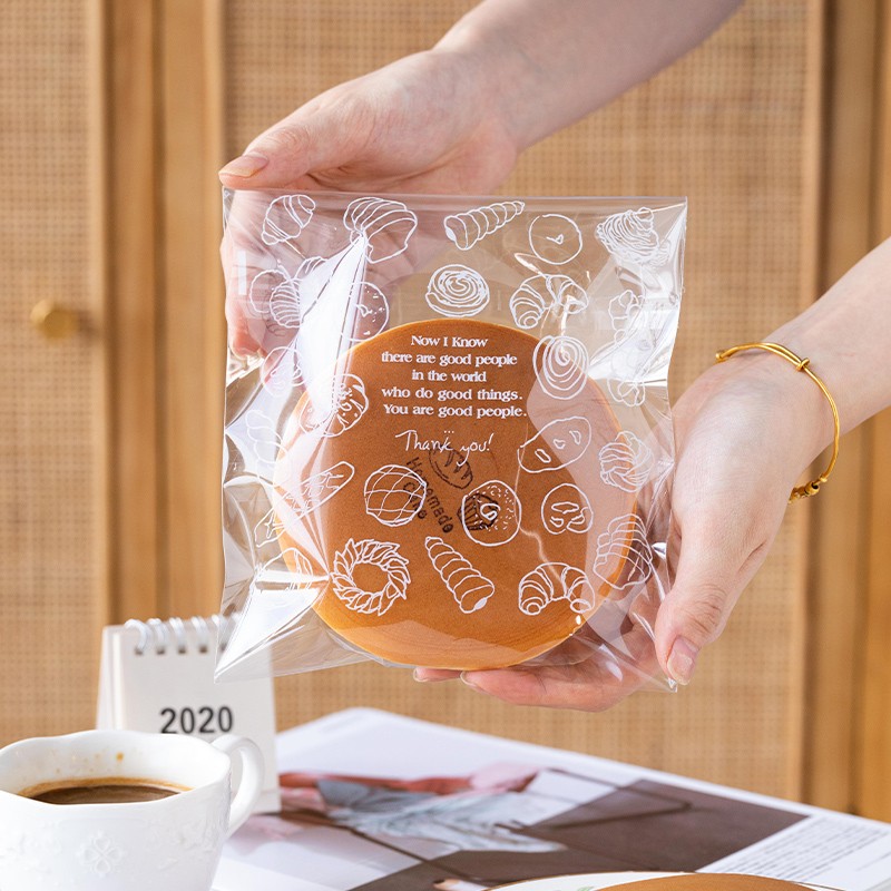 面包包装袋子  烘焙包装欧包甜甜圈吐司面包自封自粘 透明一次性 白色英文 100只入