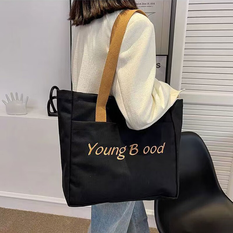 肩帆布包韩版手提百搭上学逛街韩版大容量补习袋 刺绣young黑色单肩包