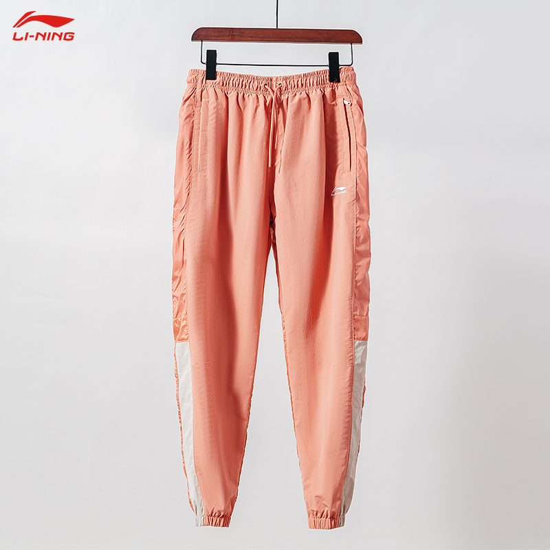 李宁运动裤女士2021新款束脚收口梭织速干宽松长卫裤女 风沙粉aykr022