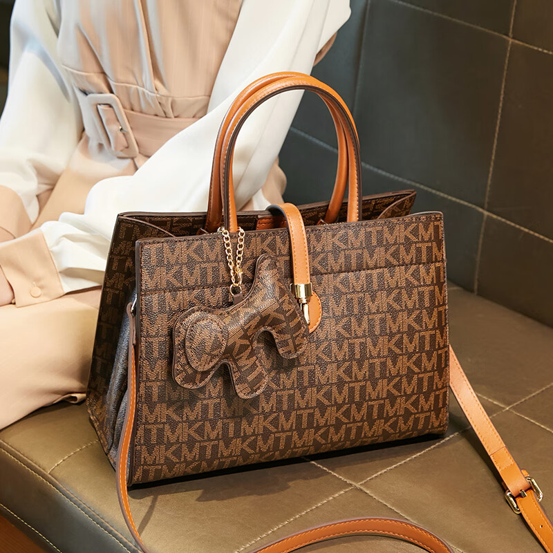 酷奇袋鼠真皮手提女包新款夏季时尚女士包包大容量斜挎包妈妈 黄-520