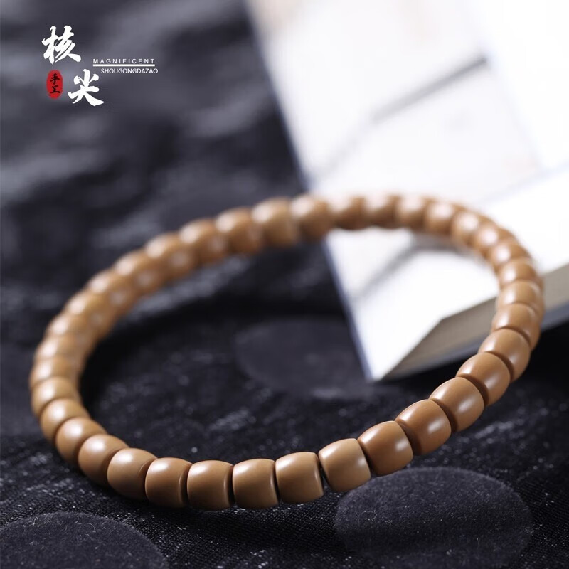 S级毕业核尖直切108颗橄榄核核尖手串桶珠核尖珠文玩手链男女佛珠 6mm直切单圈收藏级属于什么档次？