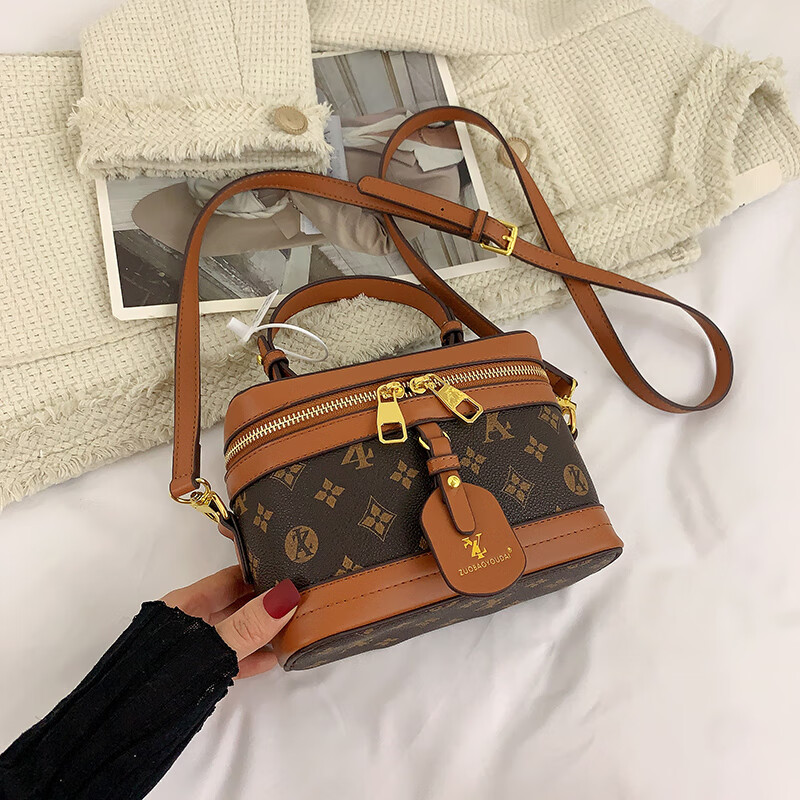 酷奇袋鼠(kuqidaishu)品牌复古印花手提水桶包包女包新款大容量单肩斜