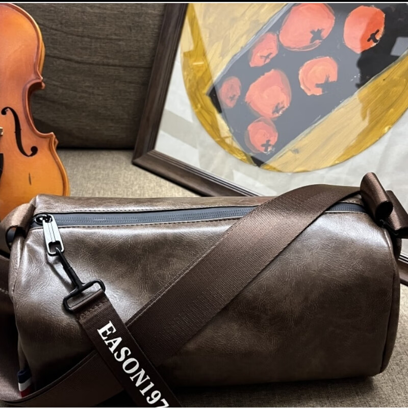 伊森单肩包男休闲男士斜挎包简约运动小背包软皮挎包圆筒包男包 黑色