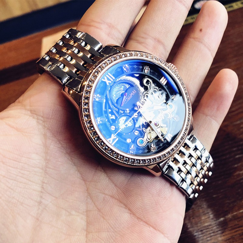 光迈新款瑞尼自动机械表镂空飞轮手表男防水夜光商务雕花腕表世家 间