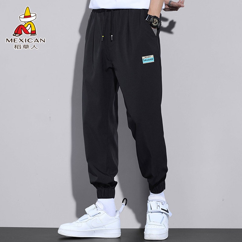 稻草人（MEXICAN）休闲裤男 潮流冰丝束脚裤男速干运动透气薄款裤子男春秋 J9FA231120122 黑色 L