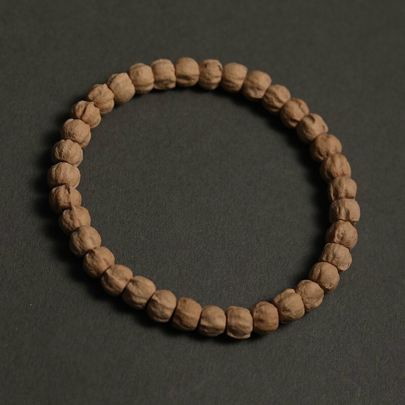 莲雨恋星西藏百香籽原皮原色小尺寸单圈手串 念珠 柏深坑鬼脸热振产区