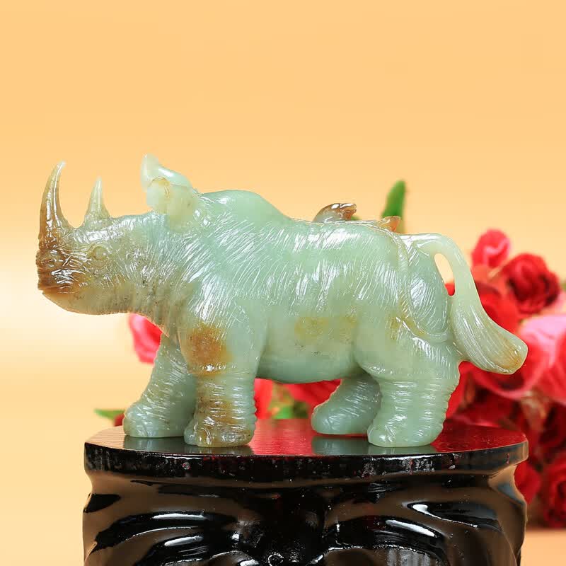 玉雕工艺师谭琪俊作品 和田玉黄口料犀牛扭转乾坤手把件摆件470克