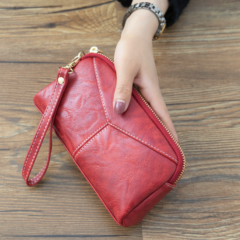 袋鼠新款日韩长款女士女包简约百搭手拿包简约零钱手抓包手机包 酒红色高性价比高么？