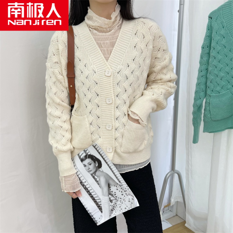 高档女装手工勾花镂空v领针织开衫女2021气质温柔小兜兜毛衣外套薄款