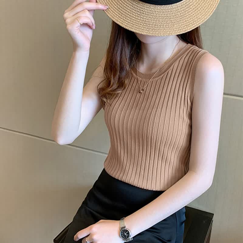 萱旎（XuanNi）2023春吊带背心女短款内搭圆领打底衫无袖针织上衣 卡其色 均码 属于什么档次？