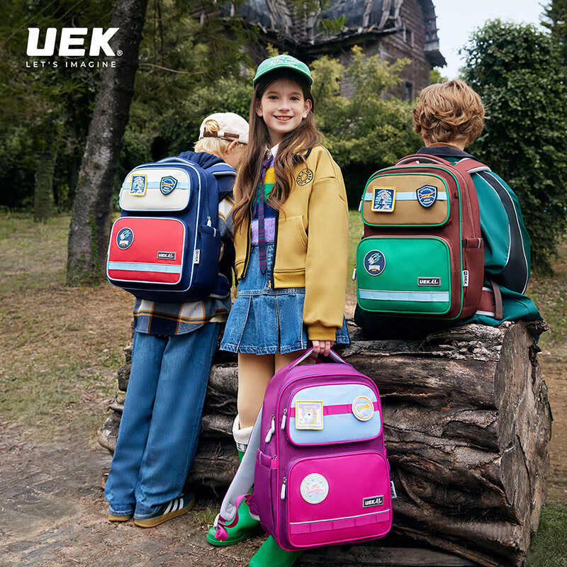 UEK儿童护脊书包男女孩1-3-6年级小学生减负轻量双肩背包大容量套装 玩趣徽章-蝴蝶兰（大号）