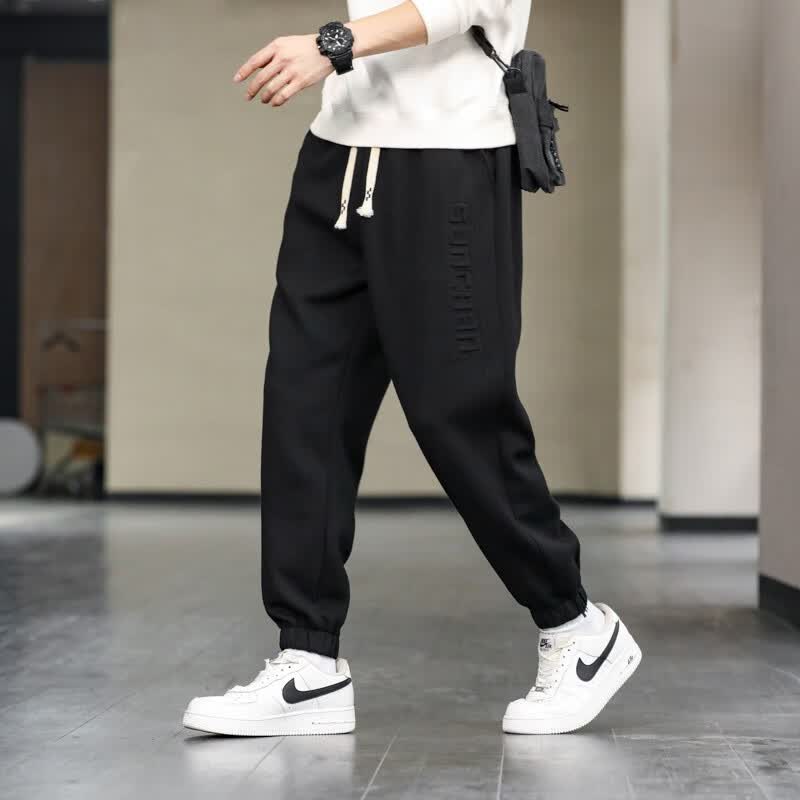 宸轩潮牌卫裤男胖子宽松弹力束脚运动裤加肥加大码休闲哈伦肥佬裤2023 黑色 5XL（210-230斤）属于什么档次？