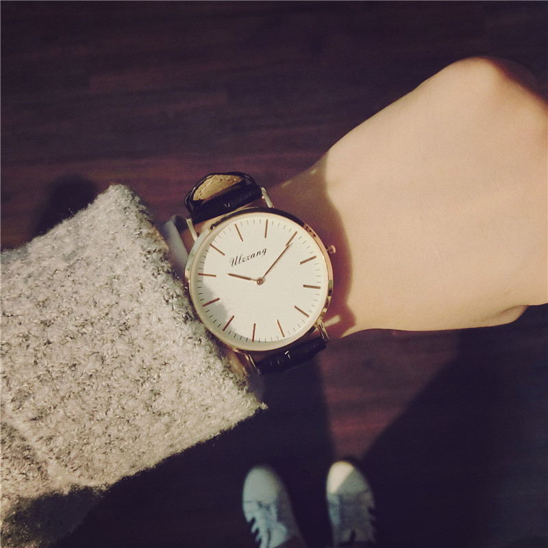 德克兴朗手表女学生韩版简约时尚创意个性男皮带圆形大表盘无秒针表潮