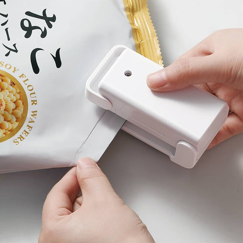 日本电热封口机迷你便携手压式塑料袋封口器家用小型零食包装袋封口神器 迷你封口机（白色）