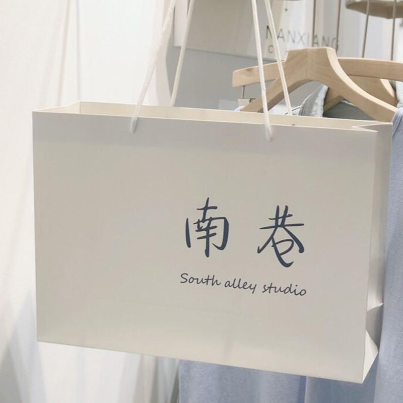 拓進男女服裝店袋子定做logo紙袋手提袋定制童裝購物袋定制手提袋加厚 定做專拍