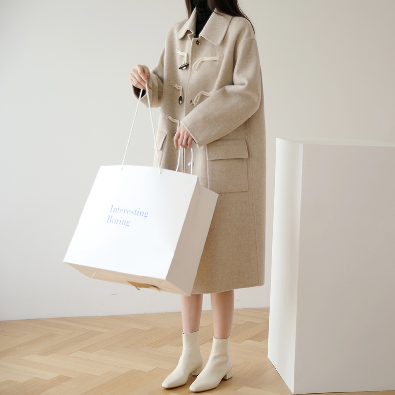 大衣哪个品牌好(女士大衣哪个品牌好)