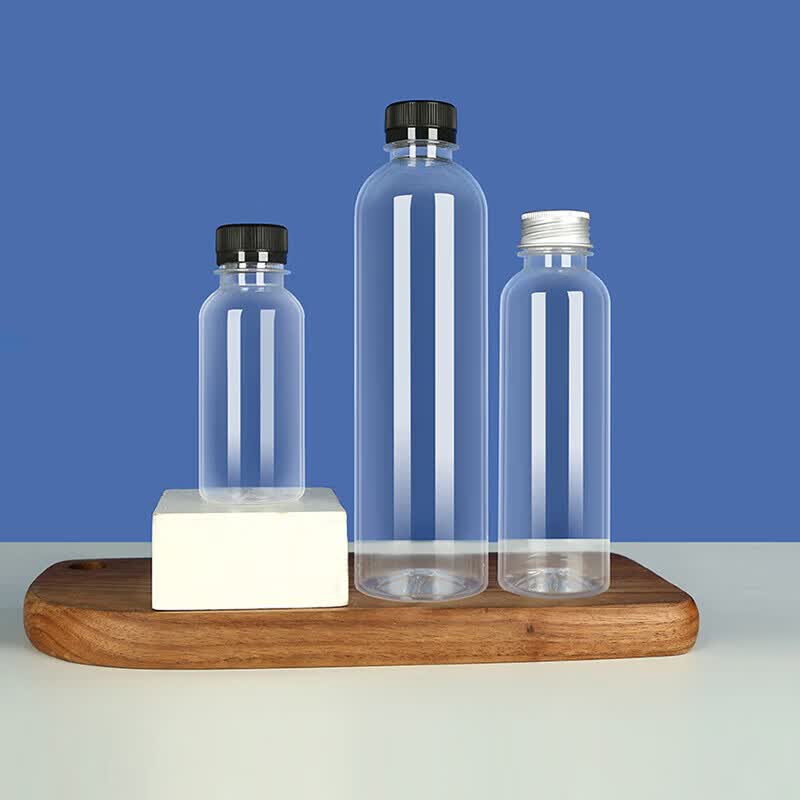 矿泉水空瓶子塑料透明食品级一次性有盖商用酒豆浆奶茶果汁瓶 加厚100