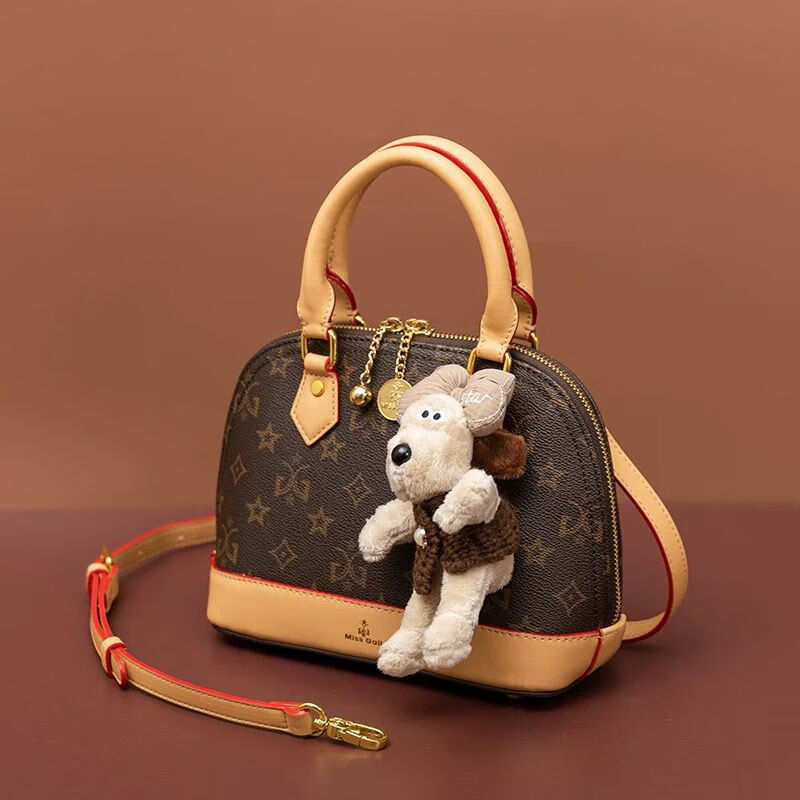 酷奇袋鼠酷奇女包高级感轻奢包包女2025新款秋冬真皮手提贝壳包女斜挎小包  棕色