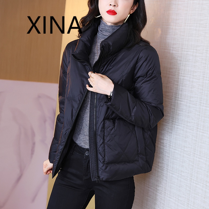 xina 香港潮牌轻薄型羽绒服女2022年冬季新款立领纯色韩版修身显瘦小个子短款黑色高端白鸭绒外套 黑色 XL