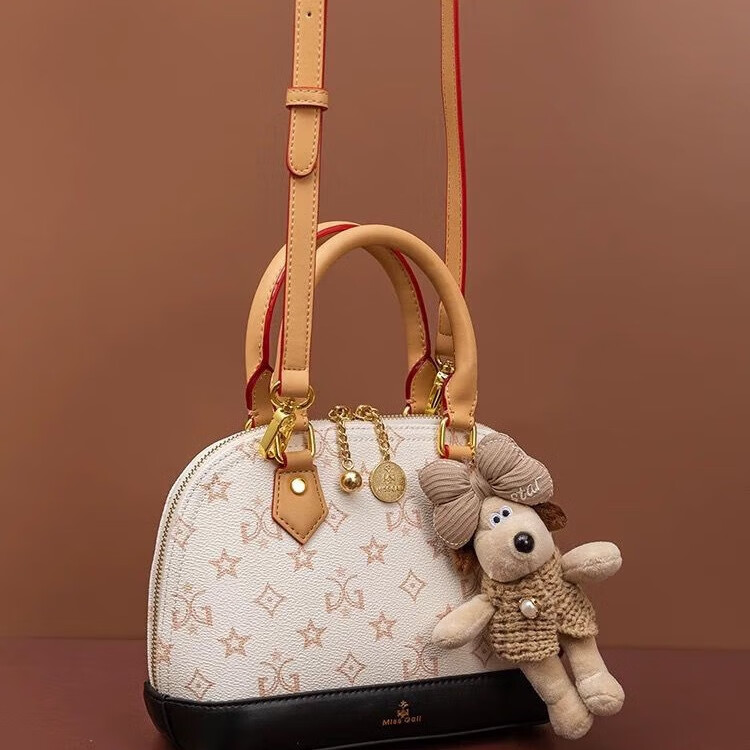 酷奇袋鼠酷奇女包高级感轻奢包包女2025新款秋冬真皮手提贝壳包女斜挎小包  棕色