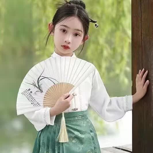 伊顿德鲁女童马面裙套装新款明制中国风汉服复古民族风唐装四季百搭连衣裙 单独长袖立领上衣MLY11 140属于什么档次？