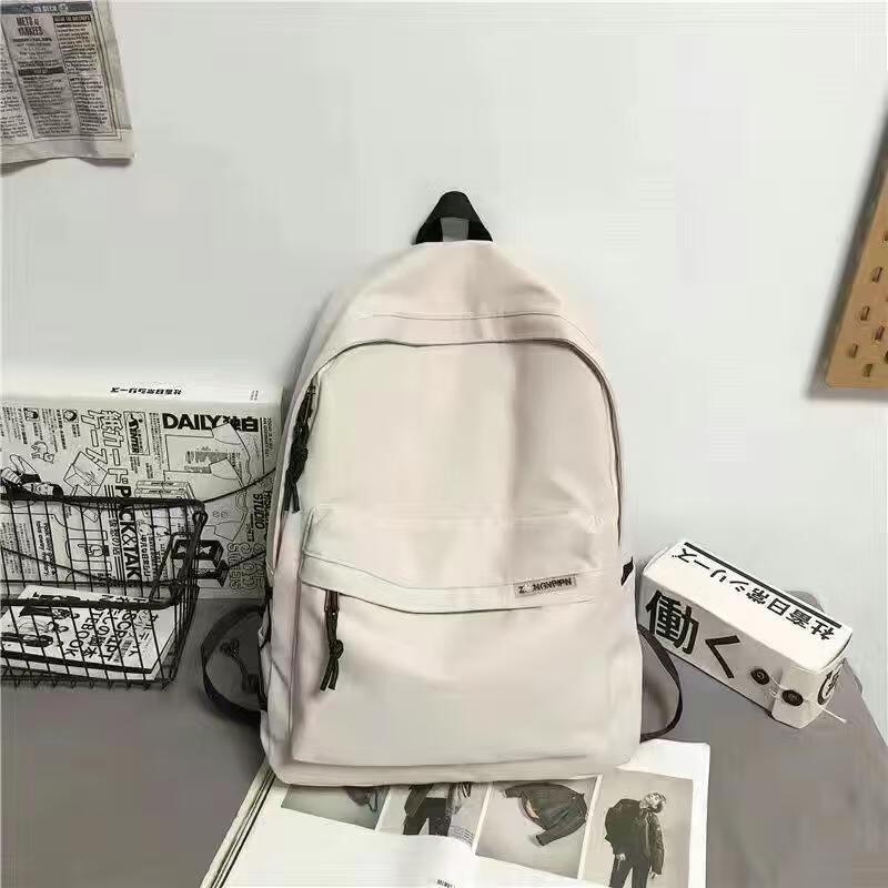双肩包男士简约大容量旅行背包女休闲日系初中生高中大学生书包男 白色