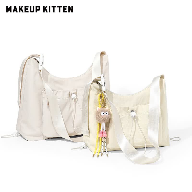 MAKEUP KITTEN斜挎包女2026新款通勤包单肩包学生书包挎包邮差包520情人节礼物 卡其色-中号【赠可爱挂件】
