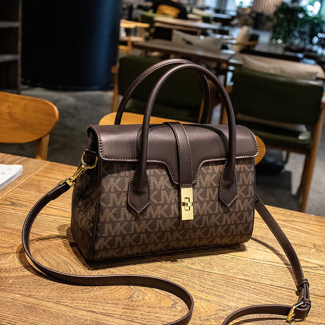 酷奇袋鼠水桶手提包包女包复古斜挎单肩包母亲大气礼物托特包中年妈妈