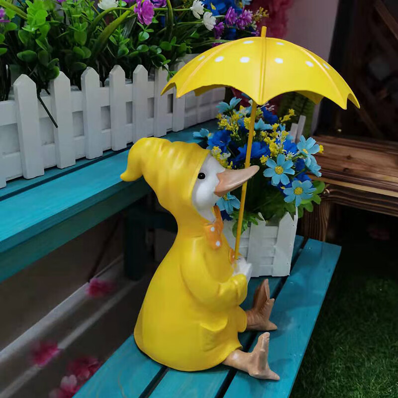 小黄鸭打伞(长宽高cm:15*12*29)