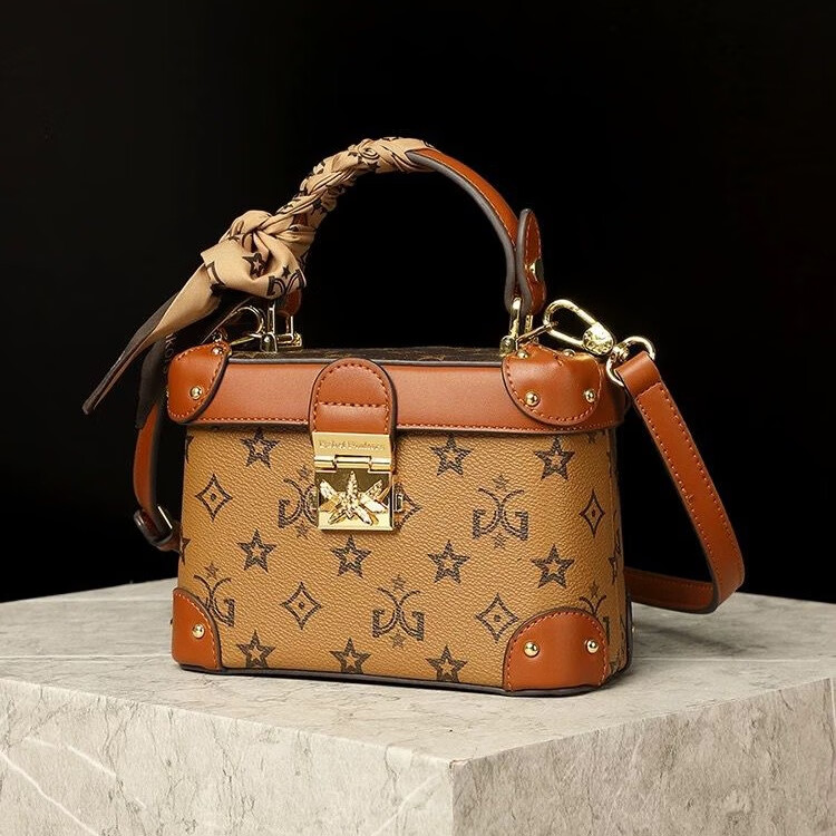 酷奇袋鼠酷奇真皮包包女士手提水桶包2025新款高级感轻奢小众化妆包斜挎包 棕色