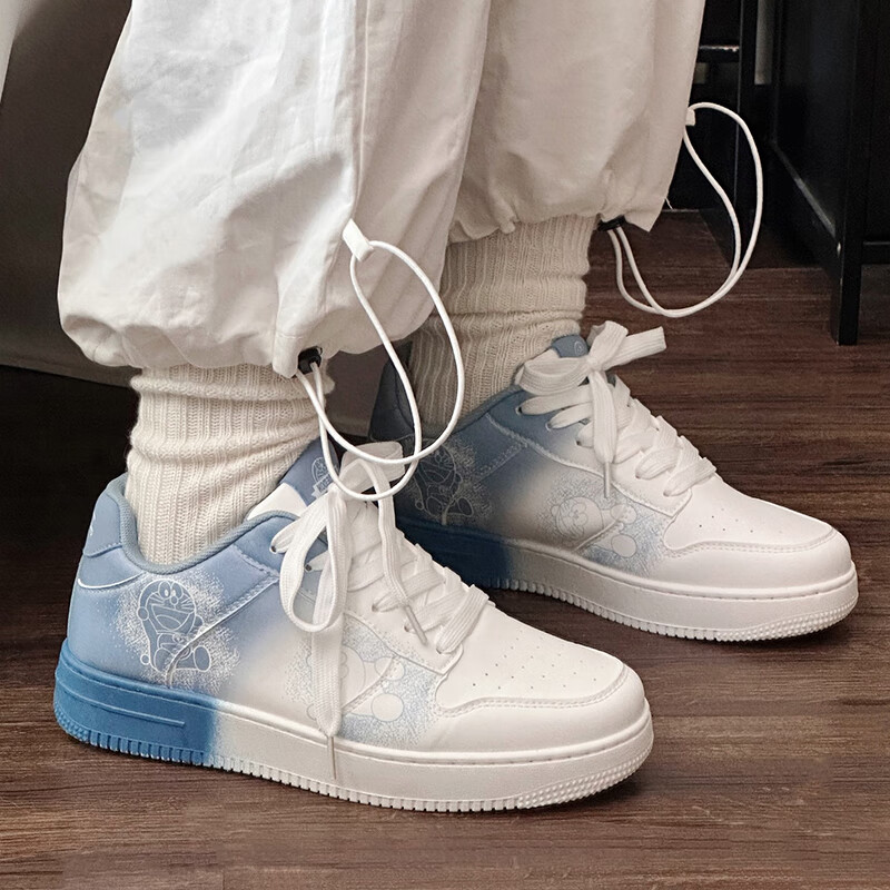 哆啦A梦男鞋低帮板鞋秋季新款渐变涂鸦鞋子男款百搭情侣鞋运动休闲鞋 渐变蓝 42