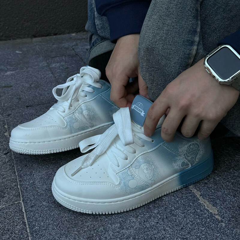 哆啦A梦男鞋低帮板鞋秋季新款渐变涂鸦鞋子男款百搭情侣鞋运动休闲鞋 渐变蓝 42