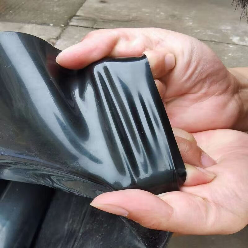 魚塘防水布防滲膜土工膜蓄水池防滲水護(hù)坡防漏專用黑色塑料布 加厚100絲防滲膜 加厚【5米寬x6米長】