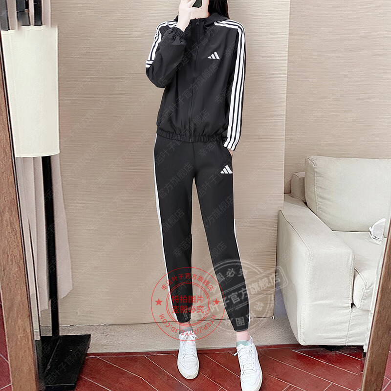 阿迪達(dá)斯 （adidas）女子梭織運動套裝 2025夏季新款快干健身訓(xùn)練服潮流時尚休閑衣褲 黑色防風(fēng)衣外套+長褲/兩件套 L