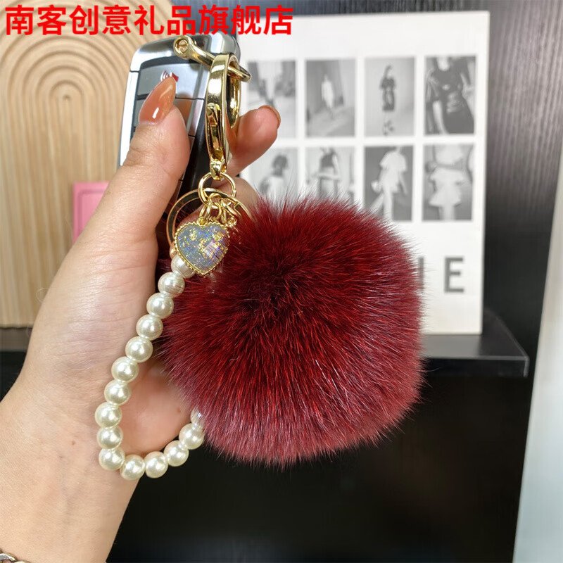 南客狐貍毛球汽車鑰匙扣掛件網(wǎng)紅毛絨包包掛飾可愛書包公仔配飾高級感 酒紅色 直徑9cm